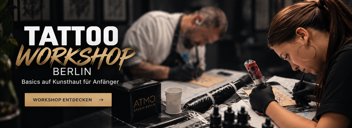 Promotional banner for a 'Tattoo Workshop Berlin' showing a close-up of a woman tattooing on skin and a man working in the background, with German text overlays and an ATM0 brand box.